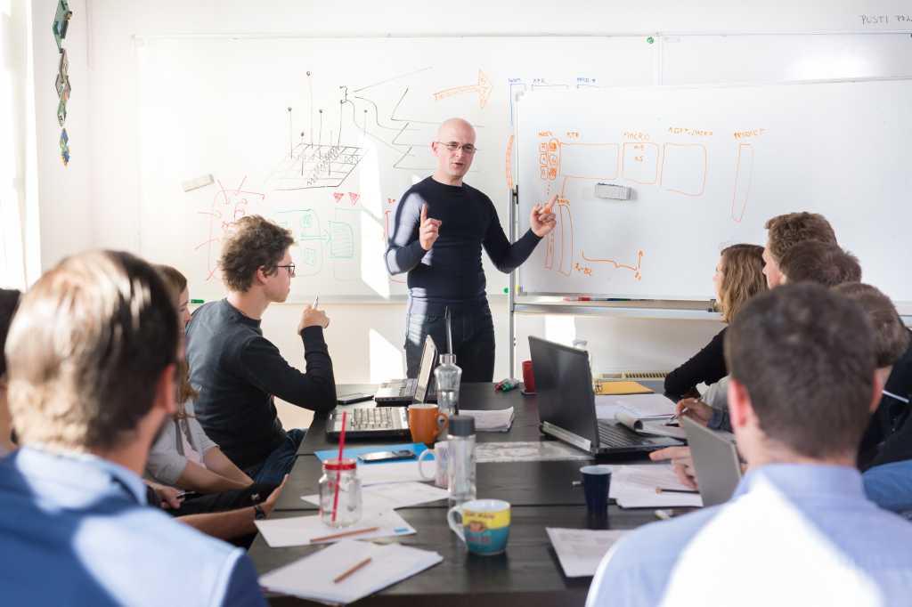 business leader presenting to colleagues