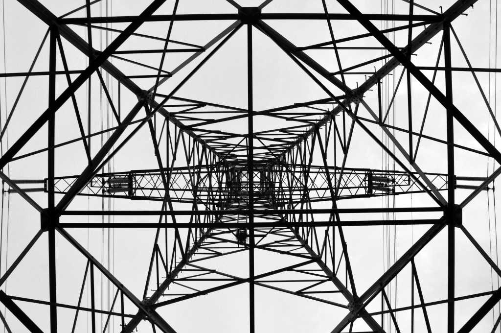 infrastructure electrical tower from below